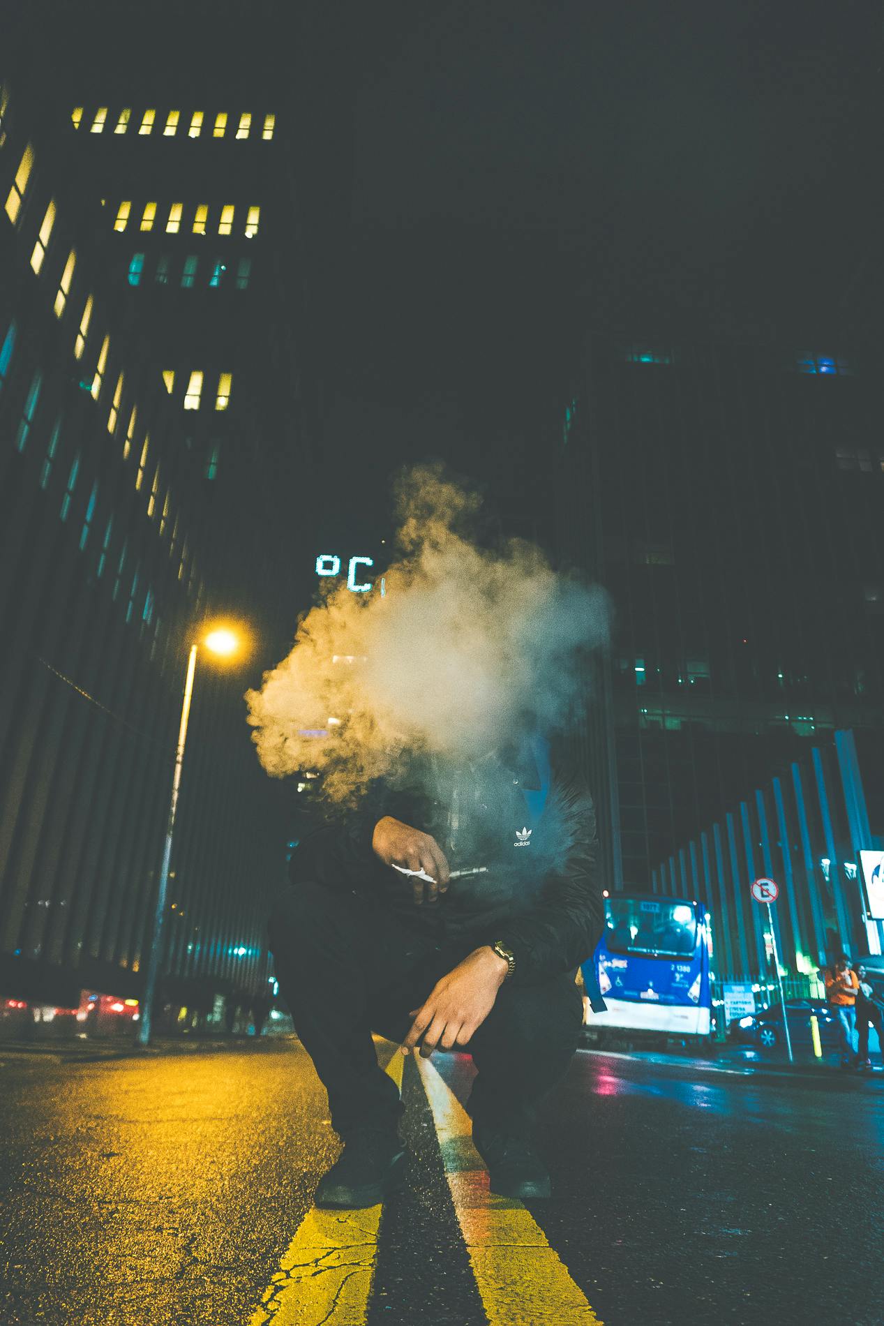 Hooded Figure Holding Red Flare C2 B7 Free Stock Photo Hooded Figure Holding Red Flare C2 B7 Free Stock Photo
