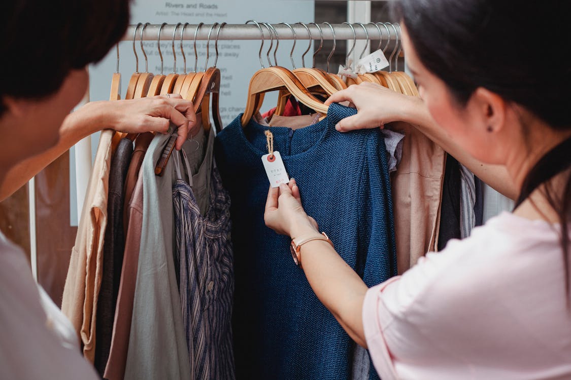 Free Women Shopping in a Clothing Store  Stock Photo
