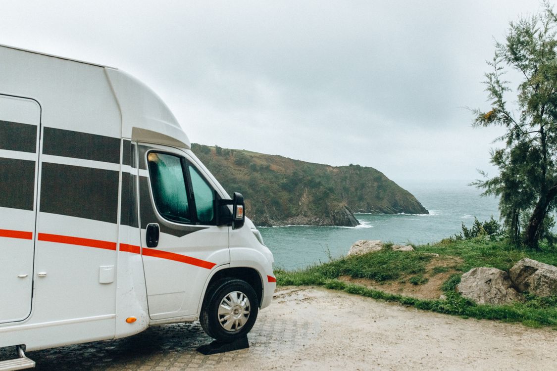 Free Whte Van Parked on Seaside Stock Photo