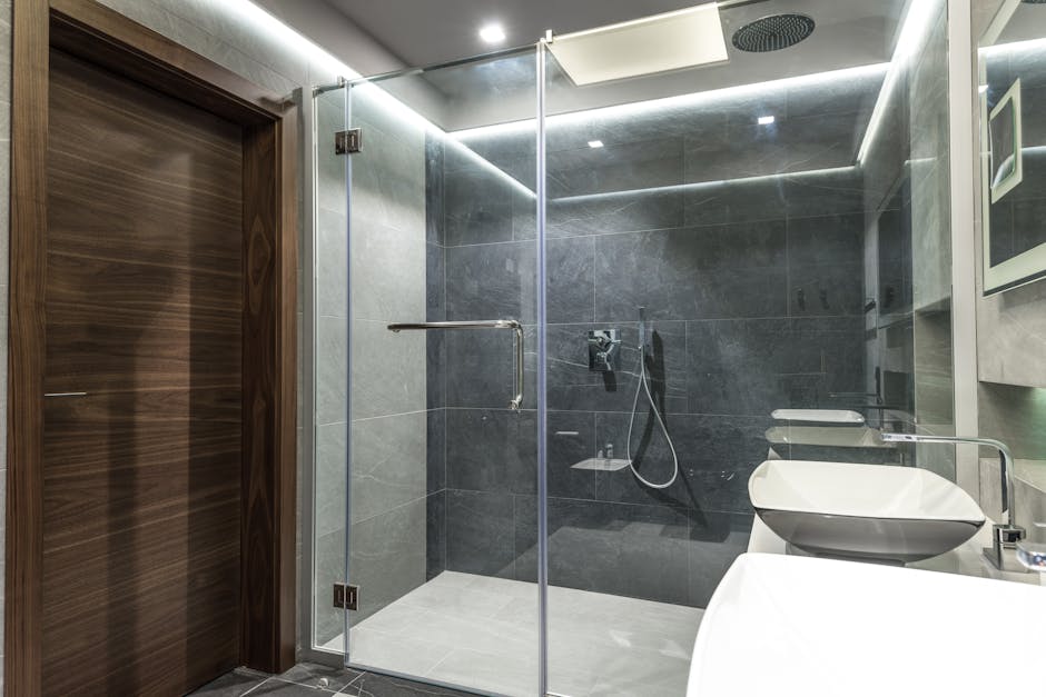 spa-like walk-in shower with frameless glass - kitchen and bath remodeling orlando fl
