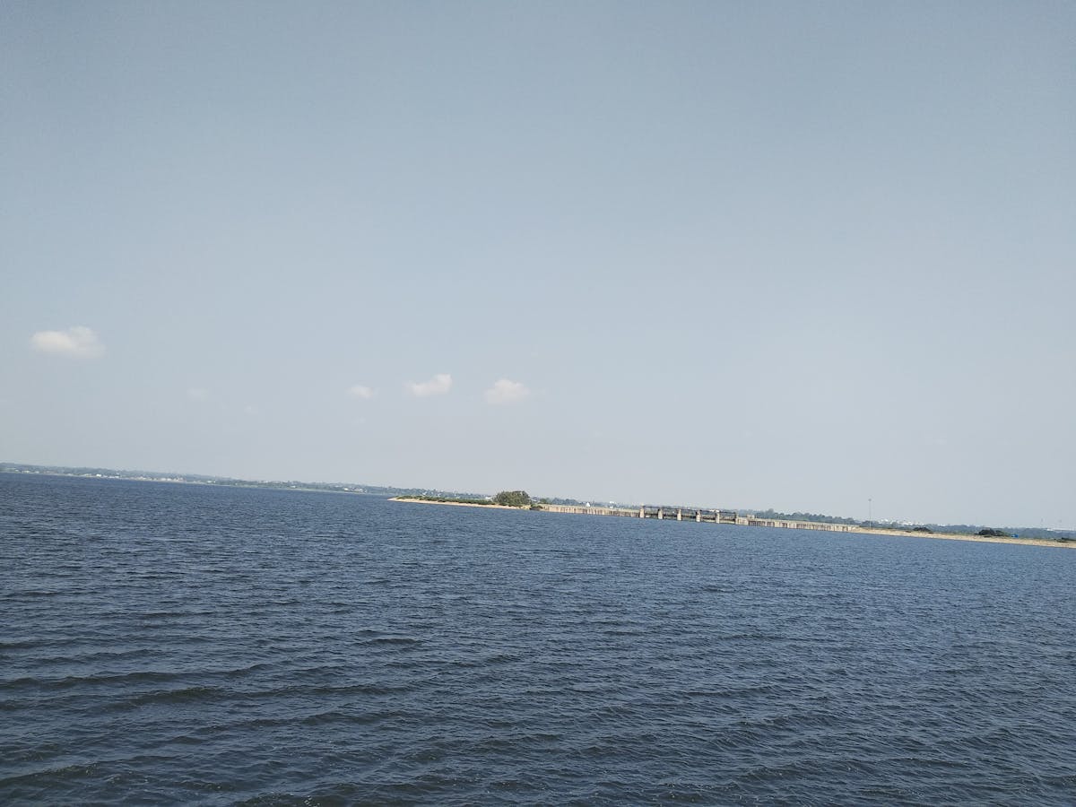 Close-up of chia pudding topped with fruit and nuts in a glass