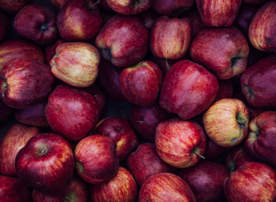 A vibrant collection of fresh red apples, perfect for harvest season imagery.