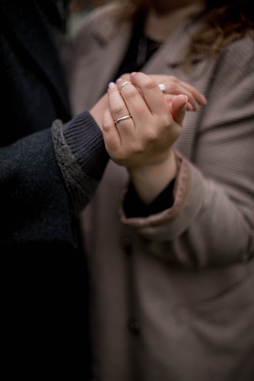 Free A Close Up on Couple Hands Holding  Stock Photo
