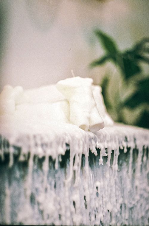 Free Close-up of white candle wax melting and dripping artistically. Stock Photo