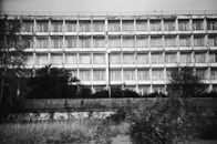 Grayscale Photo of an Old Abandoned Building