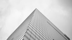 Grayscale Photo of a High-Rise Building
