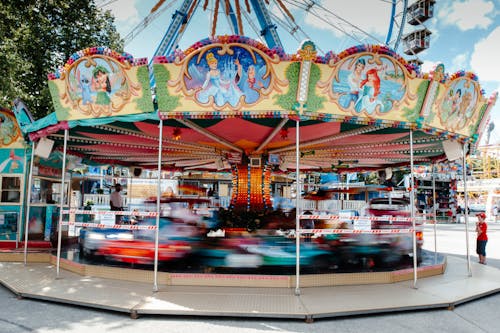 Photos gratuites de accéléré, carrousel, parc d'attractions