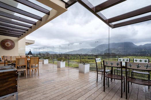 Spacious modern outdoor patio with scenic mountain views in Sopó, Colombia.