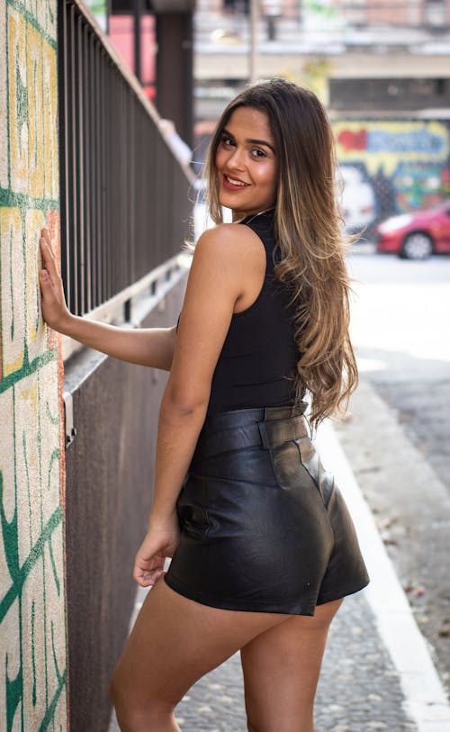 Free Photo of a Beautiful Woman in Black Clothes Looking at the Camera Stock Photo