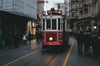 Red Tram on Road