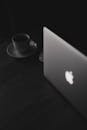 Open MacBook Laptop and Cuppa