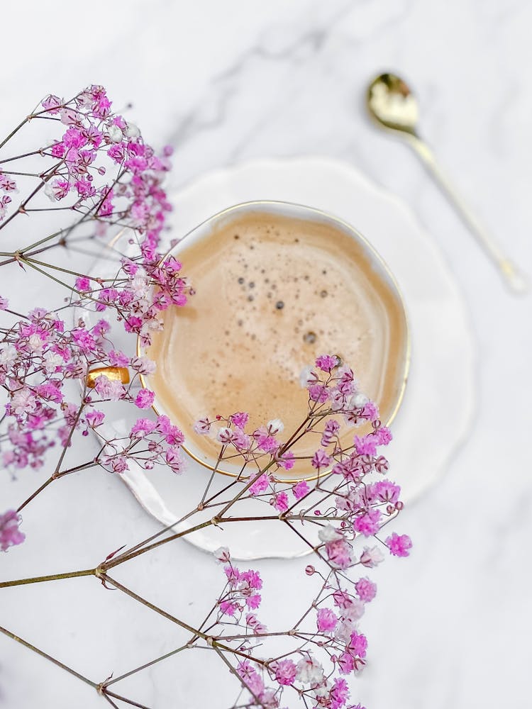 Overhead View Of Pink Gypsophila And Coffee Cup