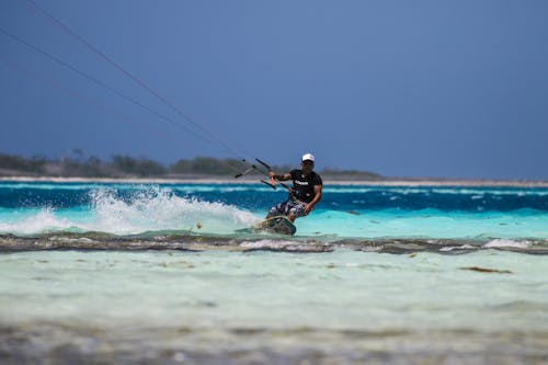 Безкоштовне стокове фото на тему «kiteboarder, водні види спорту, дорослий» стокове фото