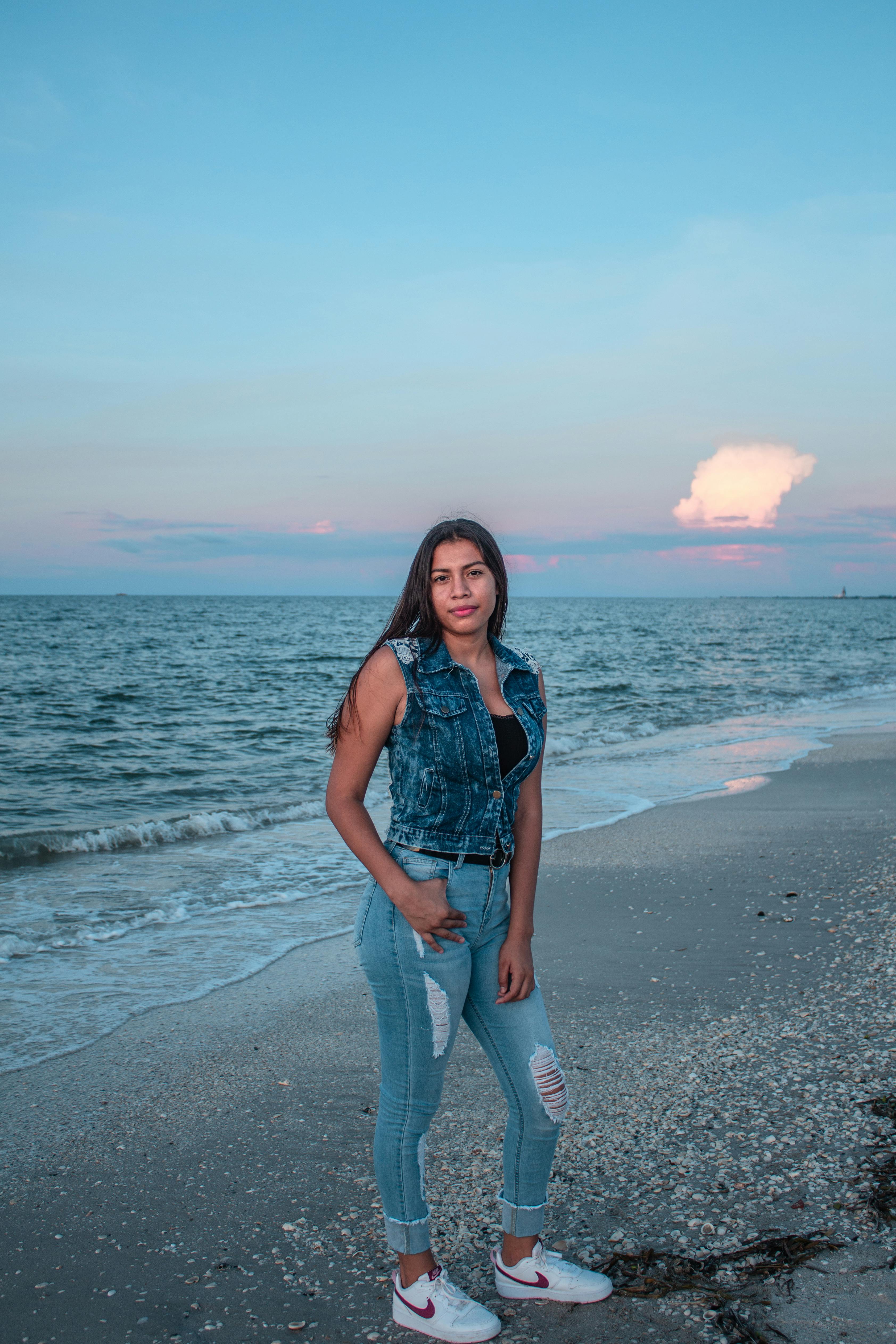 Barefoot Woman Jeans Sitting On Shore Stock Photo 434752246 | Shutterstock