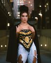Portrait of Fashionable Woman in City at Night
