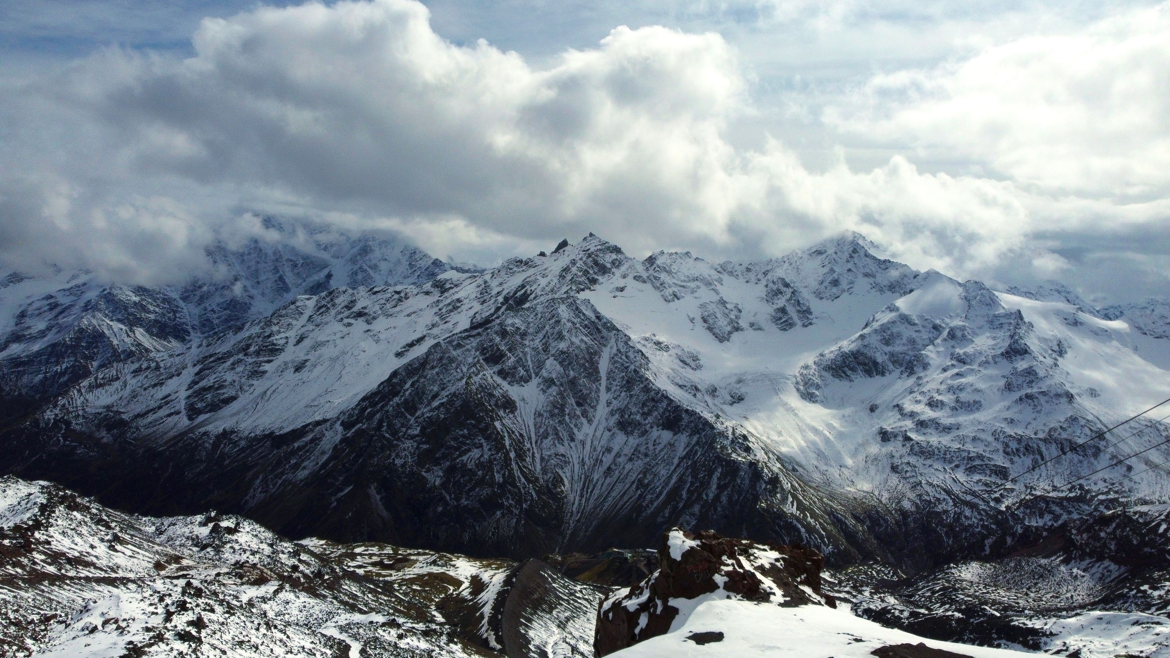 Snow Covered Mountain Under White Clouds · Free Stock Photo