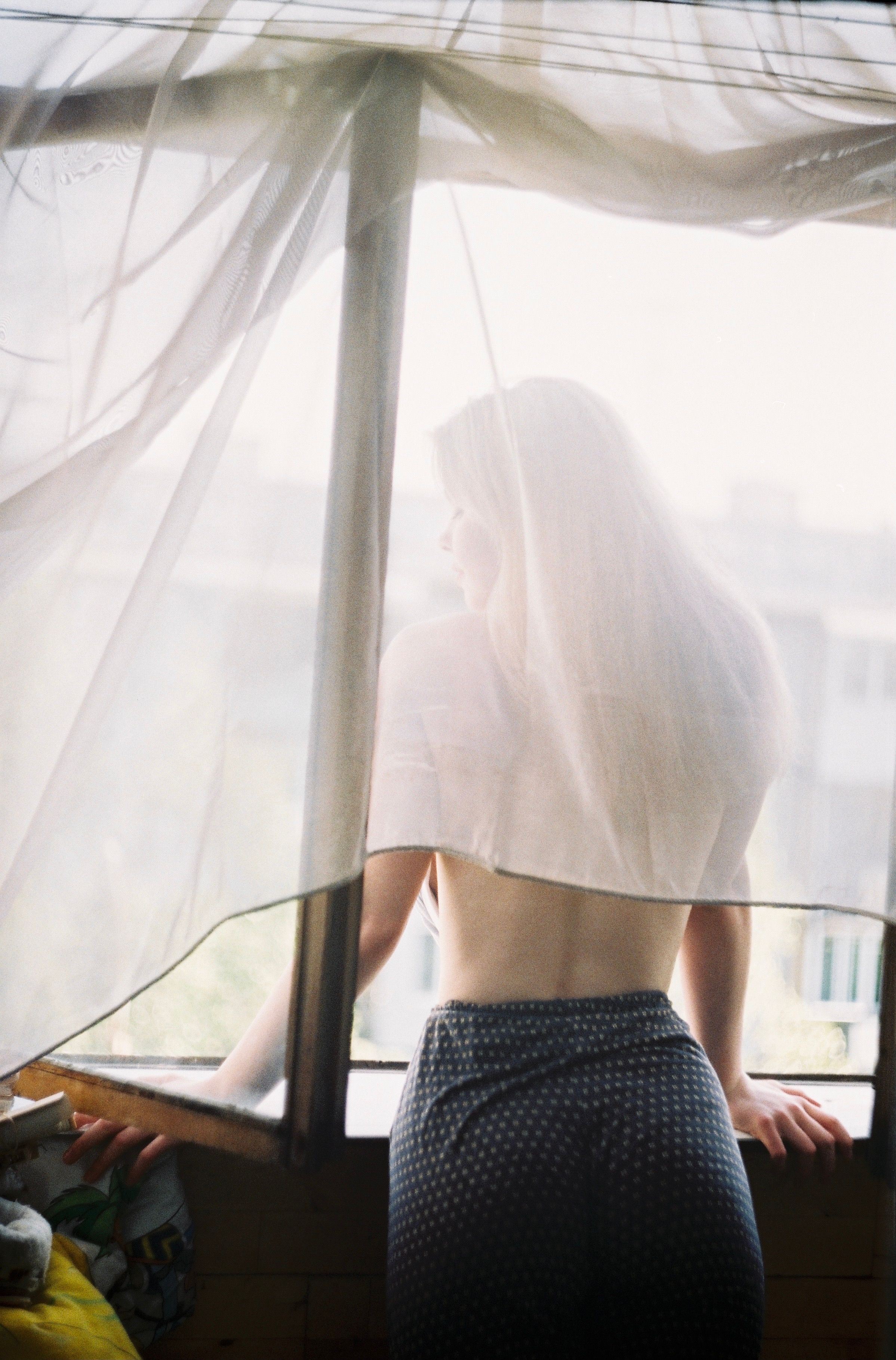A Woman Looking Outside the Window · Free Stock Photo