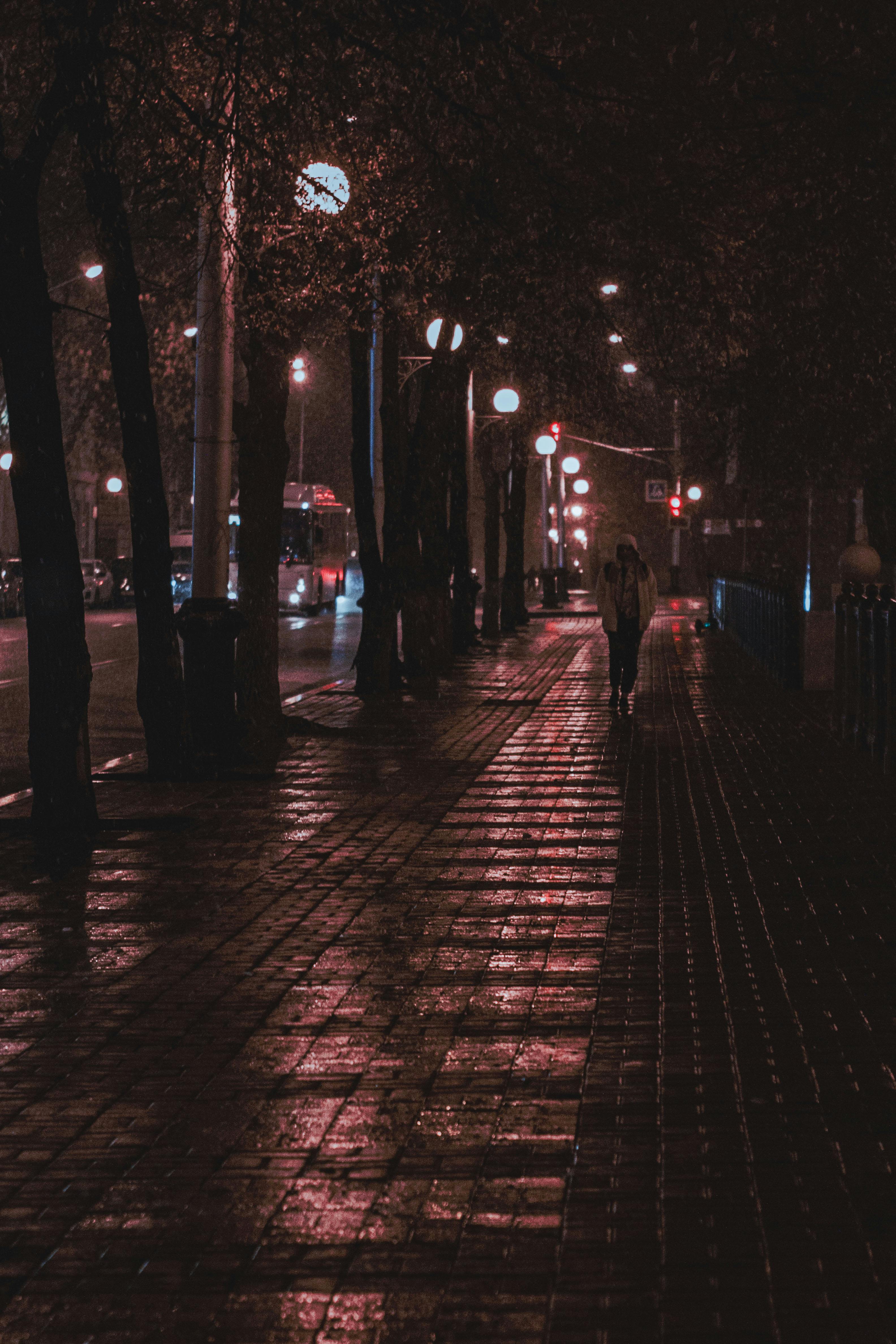 People Walking in the Hallway at Night · Free Stock Photo