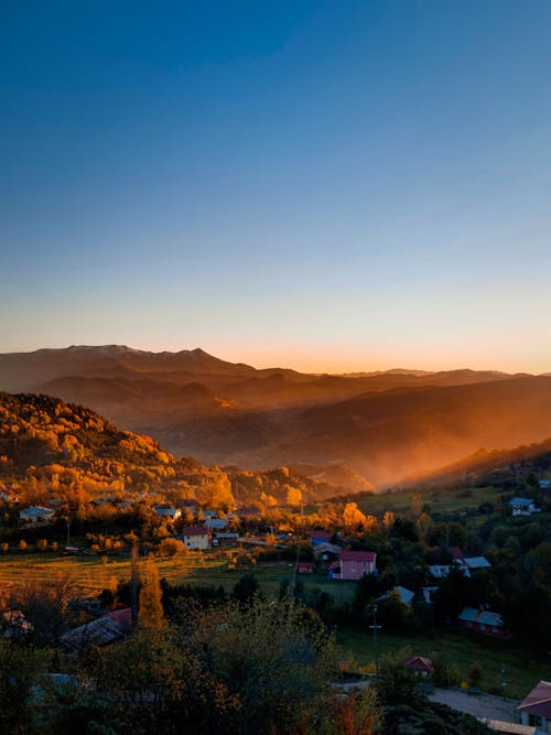 Aerial View of Houses Near Mountain