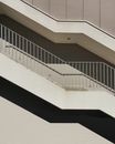 White Concrete Staircase With Black Metal Railings