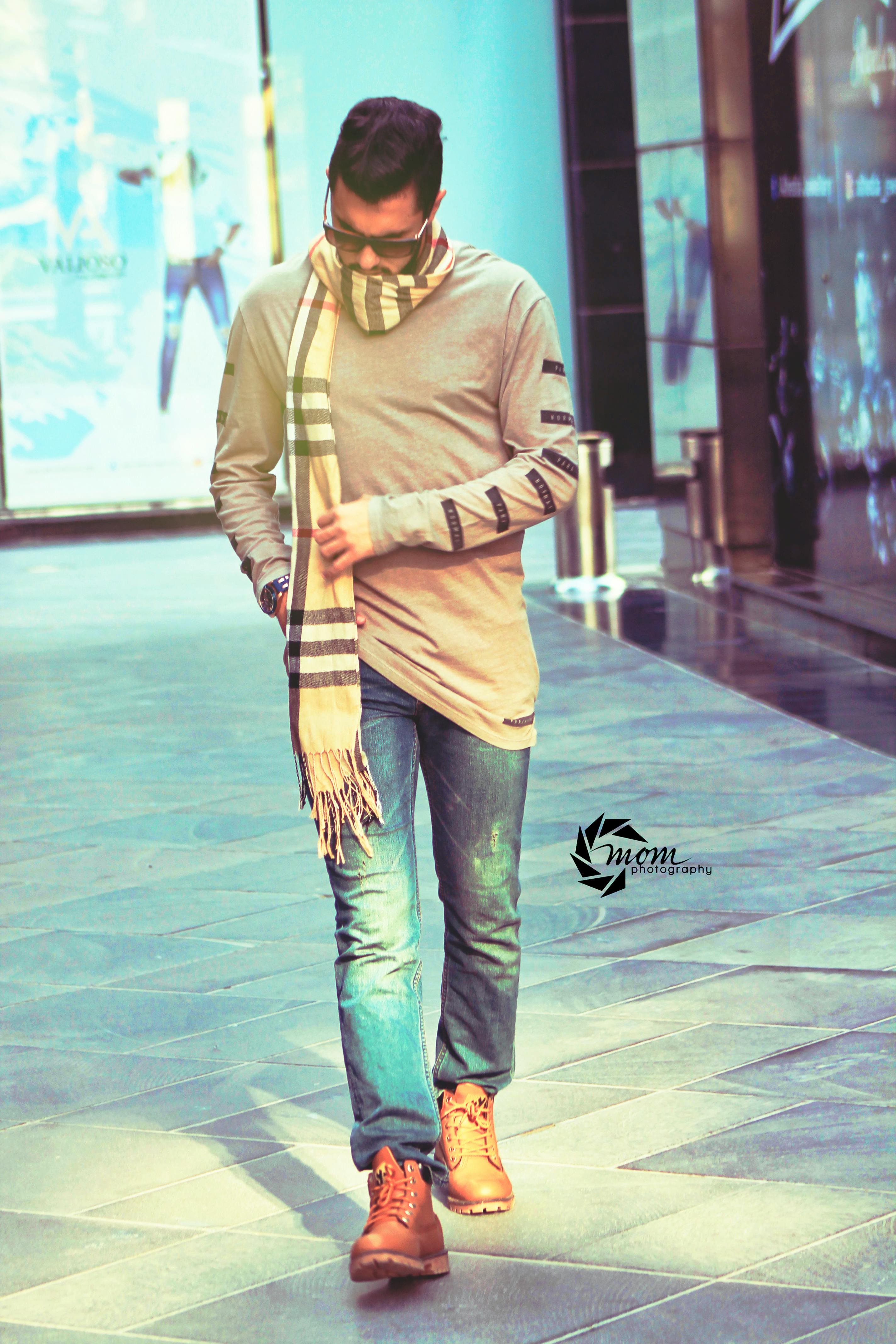 Open book and notebook with pen on a table, suggesting study or journaling