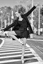 A Ballerina Dancing on the Pedestrian Lane