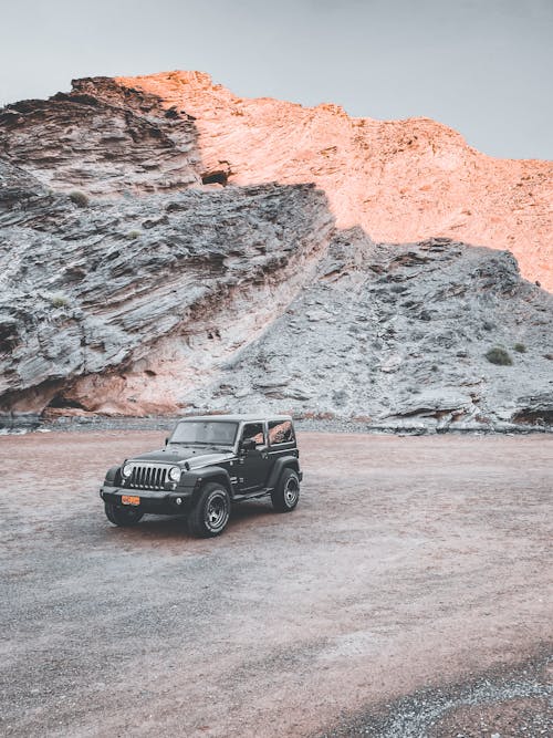 Black Jeep Wrangler Parked Near Big Rock Formation