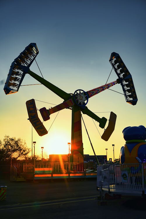 Free stock photo of amusement ride, beautiful sunset, carnival