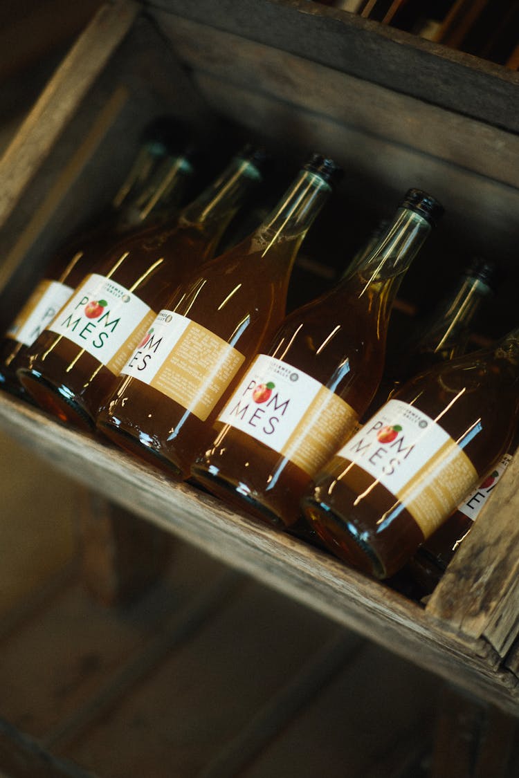 Wooden Box With Apple Juice Bottles