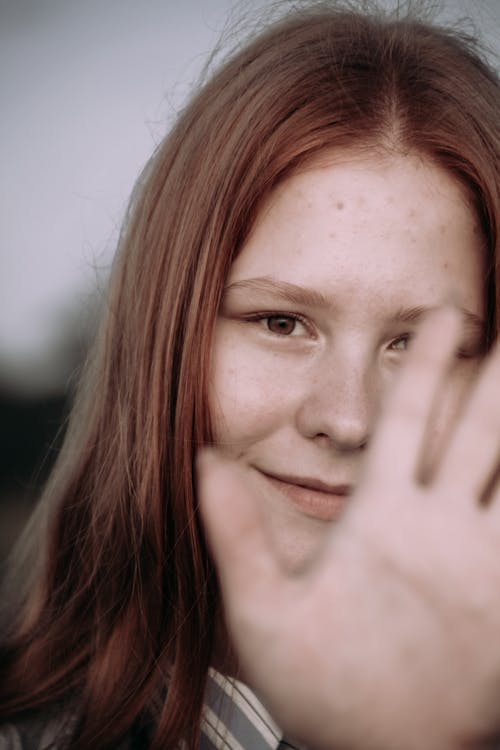 A Smiling Woman Showing Her Palm