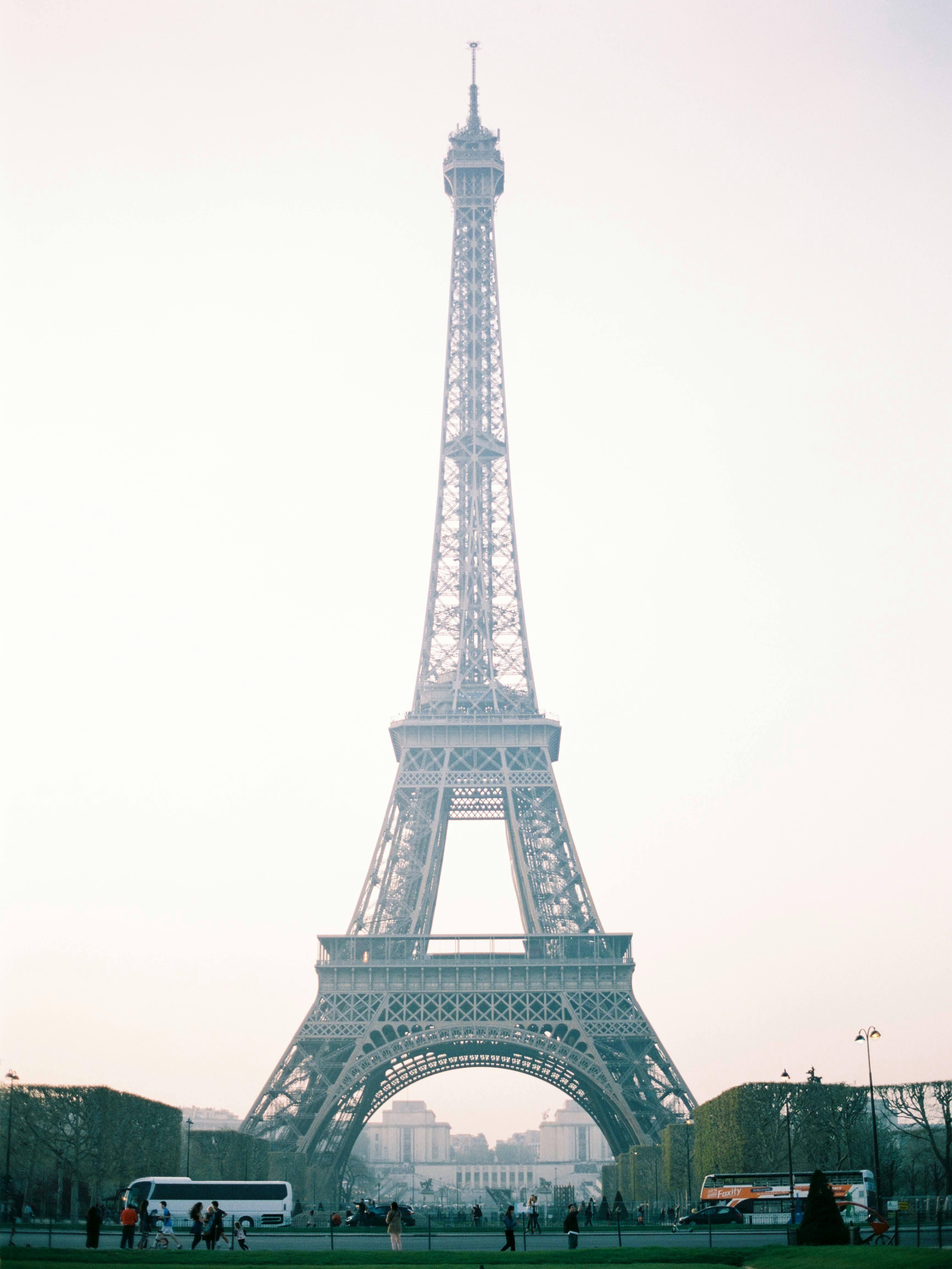 Scenic view of the Eiffel Tower in Paris with a clear sky, capturing its iconic structure.
