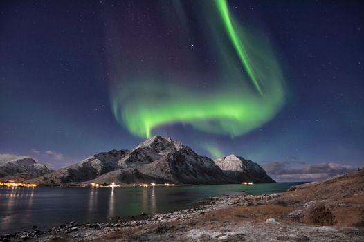 Green Aurora Lights over the Lake