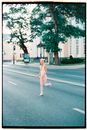 Woman in White Dress Standing on Road