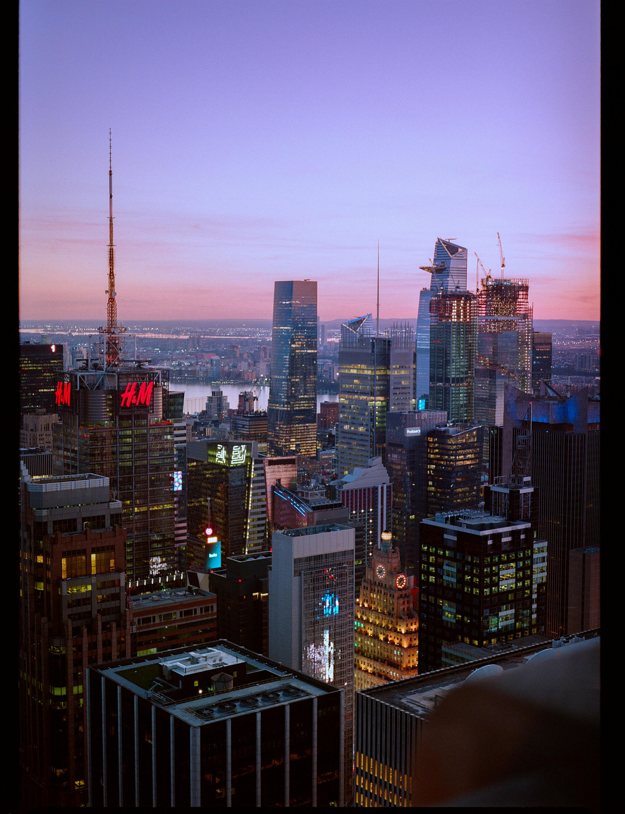 Breathtaking view of New York City's skyline at twilight, showcasing iconic skyscrapers.