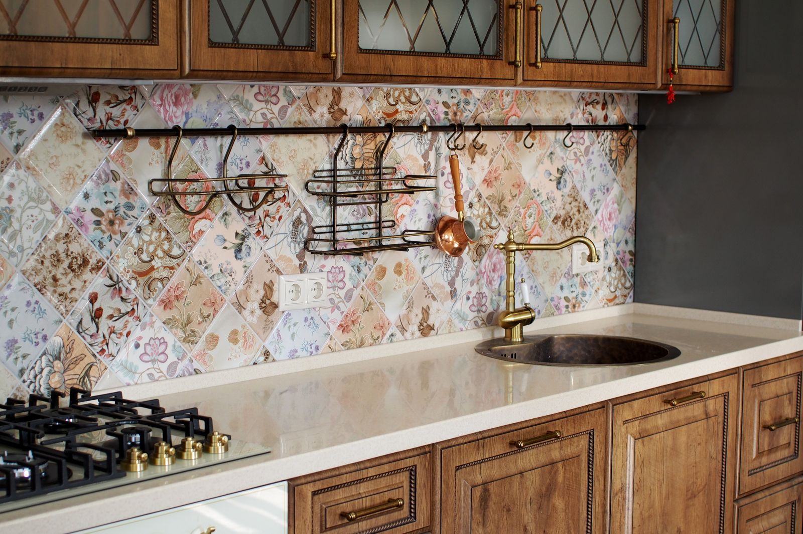Kitchen interior with floral tile backsplash