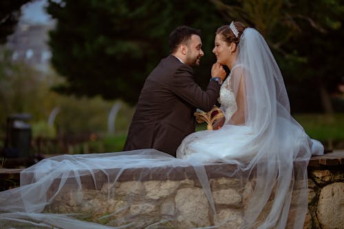 Free Photo of a Groom and a Bride Looking at Each Other Stock Photo