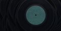 Vintage vinyl records with blank centre labels, photo by Dan Cristian Paduret on Pexels