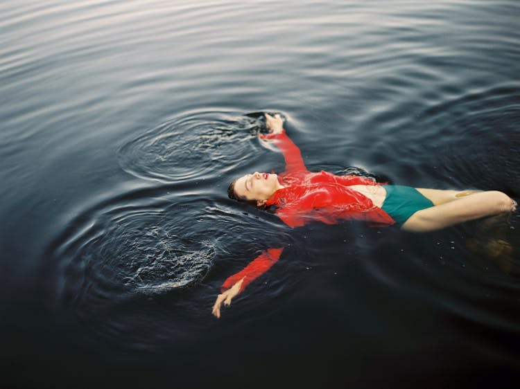 
A Woman Floating In Water