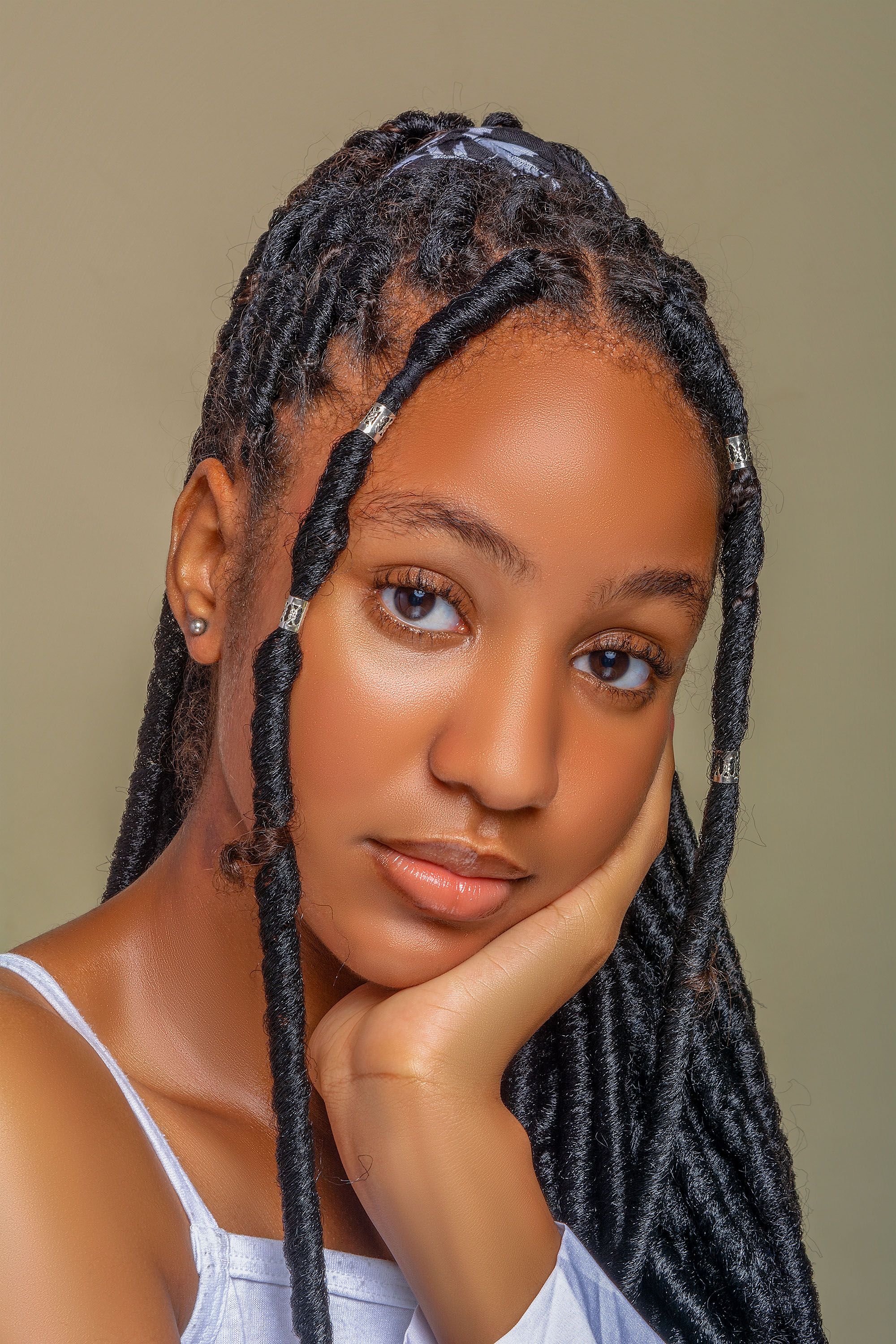 Beautiful Woman with Dreadlocks Posing with Her Hand on Her Chin · Free ...