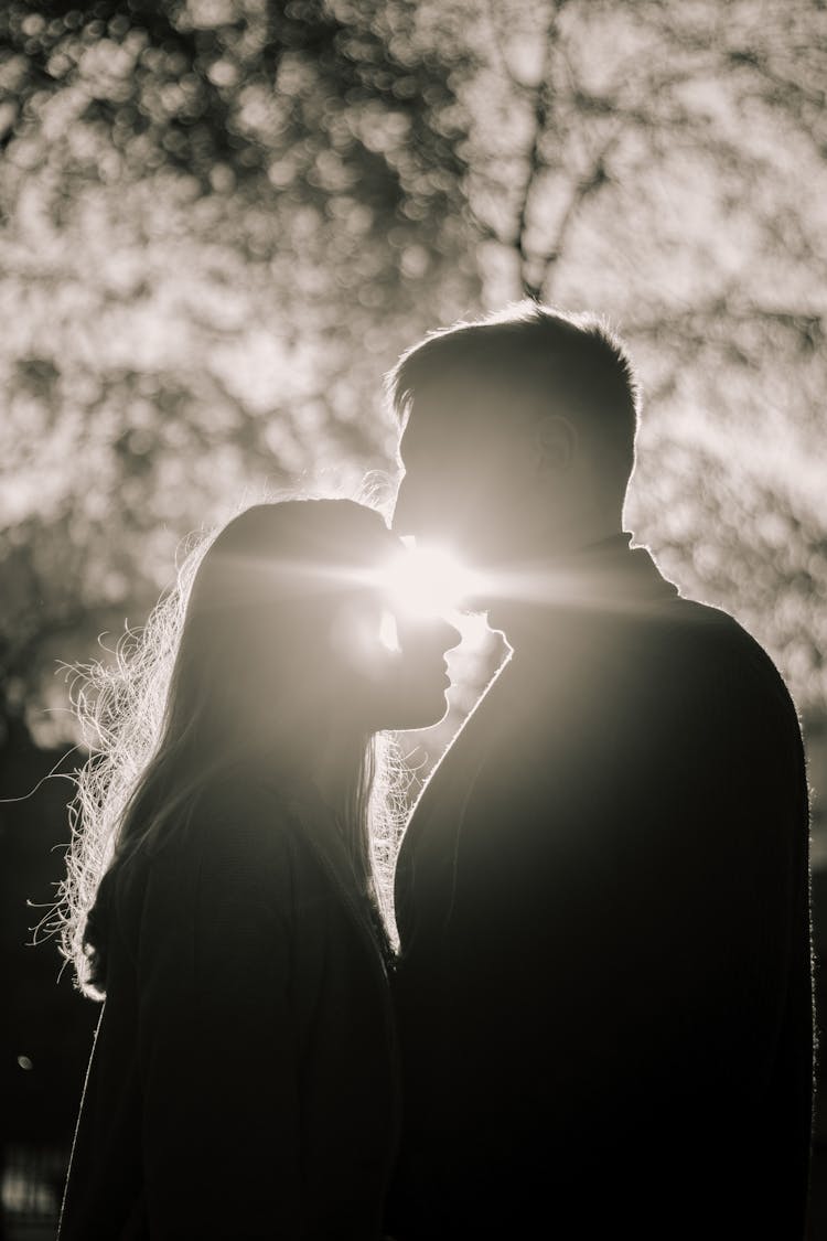 Silhouette Of Back Lit Couple