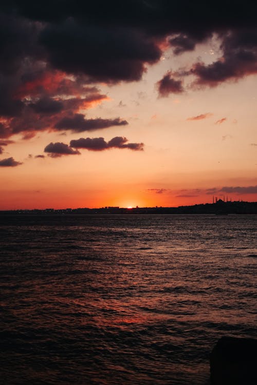 Free View of Sunset over the Horizon Stock Photo
