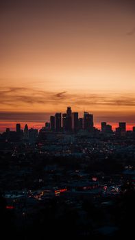 Capture of the Los Angeles skyline at sunset, beautifully highlighting the bustling cityscape.