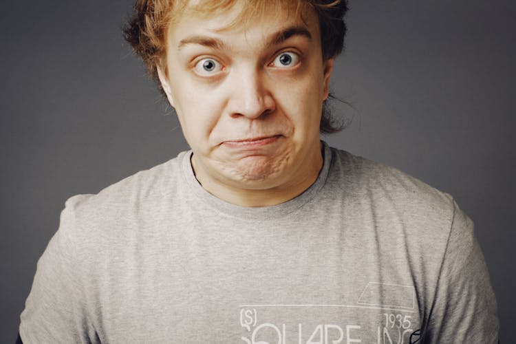 Portrait Of A Man In Gray T-Shirt 