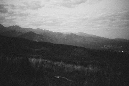 Cloudy Sky Over the Grassy Mountain