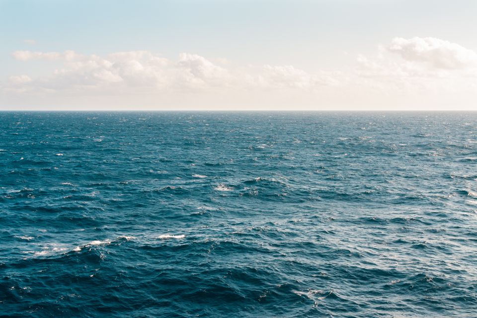 Shallow sandy sea water where weever fish bury themselves