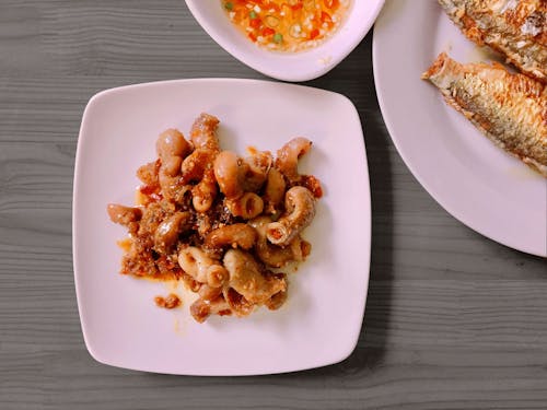 Cooked Pasta on White Ceramic Plate