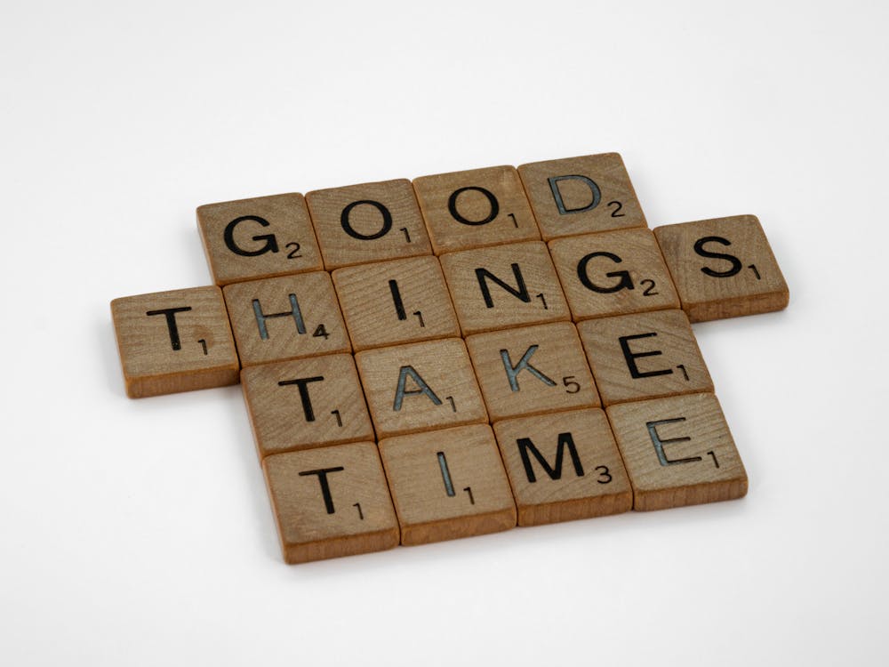 Brown Wooden Blocks on White Surface