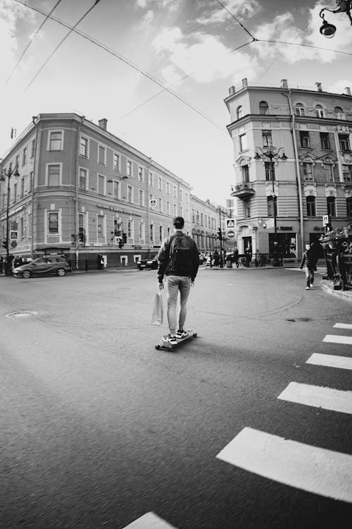 Man on Skateboard on Street