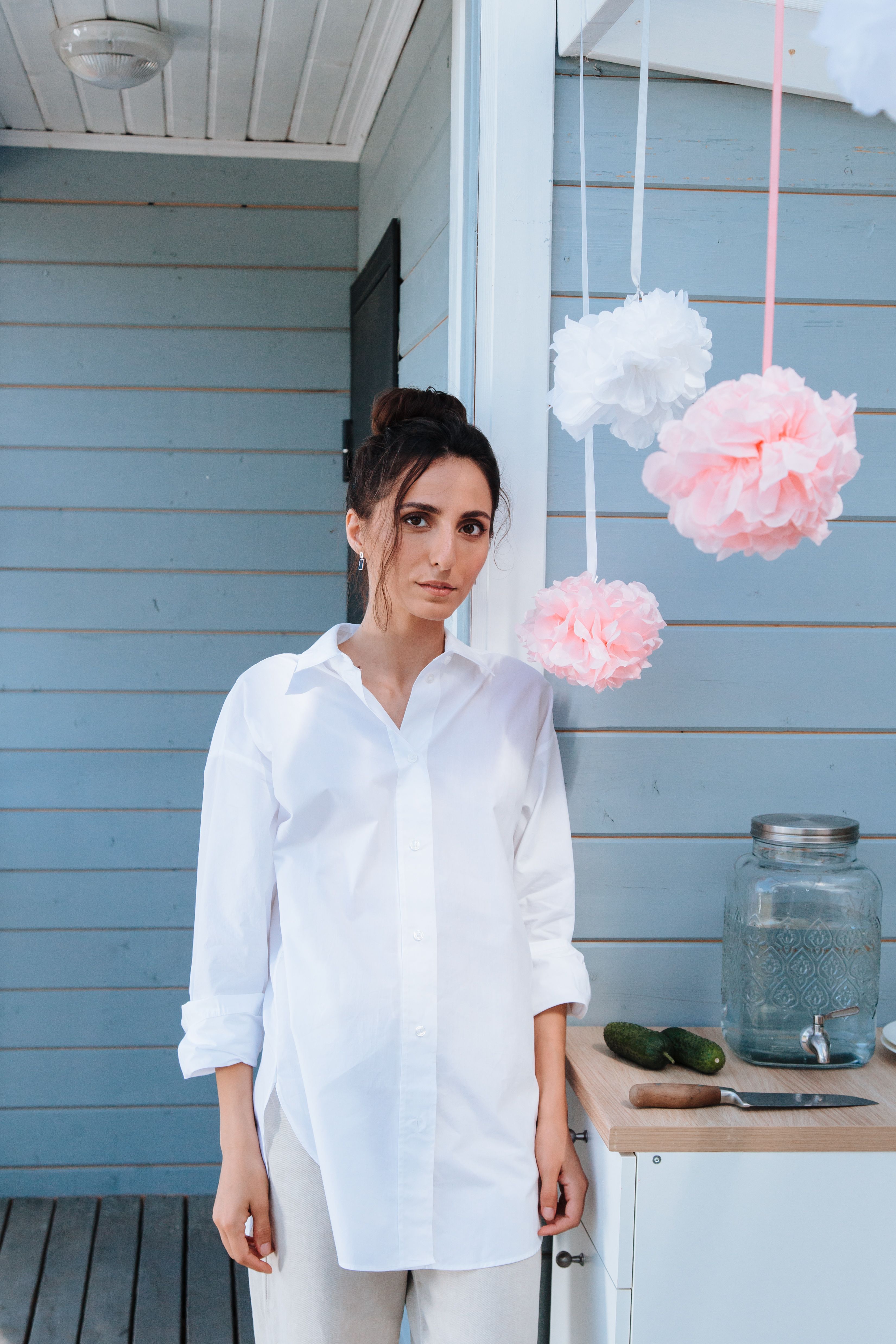 A Woman in White Outfit Seriously Looking at the Camera · Free Stock Photo