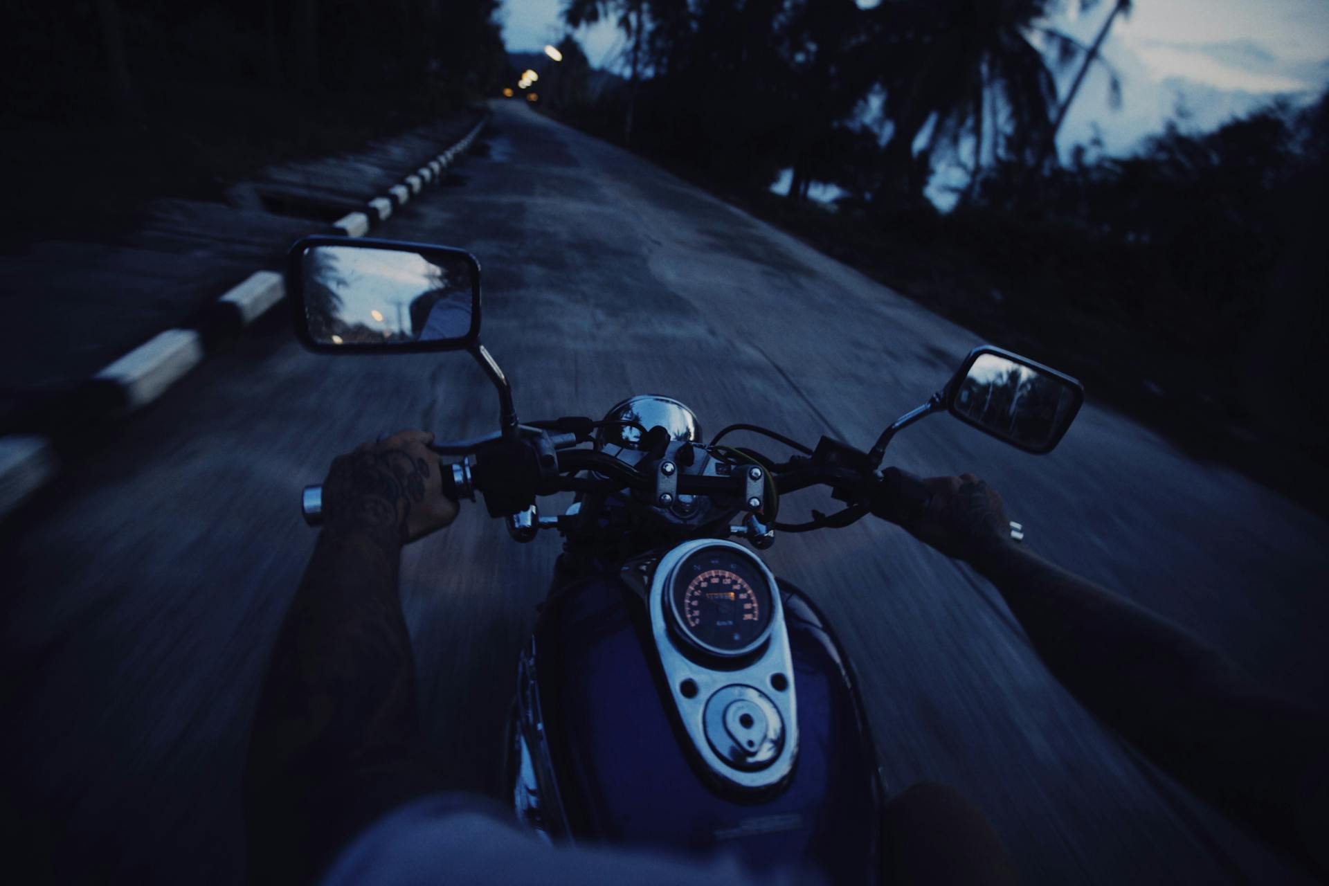 Riding Motorcycle in Evening